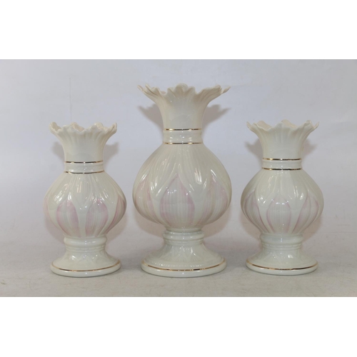 293 - Five Belleek vases, largest 20cm high.