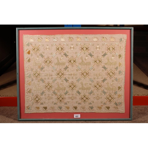 423 - Needlework panel with repeating bird and lion design, 46cm x 59cm, frame 55cm x 68cm.