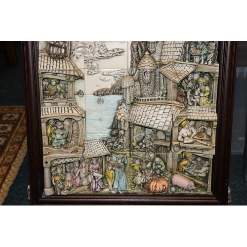 192 - Heavy cast resin diorama of a village harbour scene in wooden frame, 58cm high.