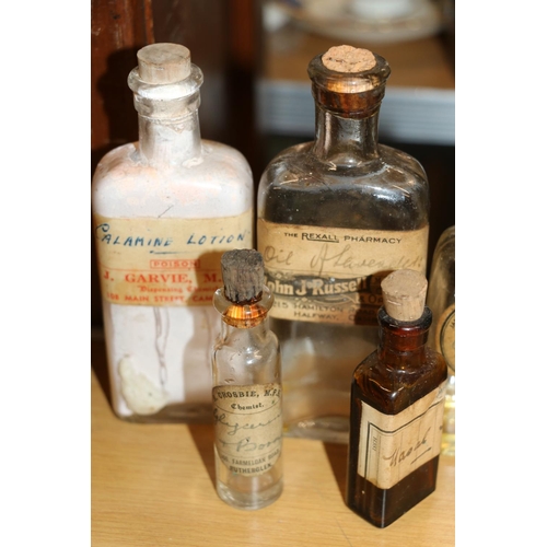 227 - Seven vintage apothecary chemists' bottles.