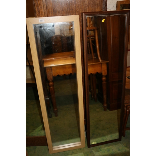 653 - Pine framed wall mirror and a similar dark wood framed wall mirror, largest 128cm high.