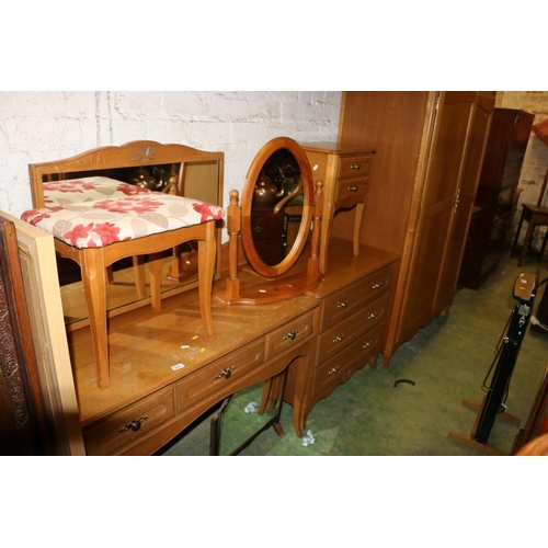 655 - Six piece pine effect bedroom suite comprising a dressing table, a stool, a bed head. bedside cabine... 