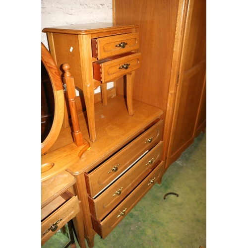 655 - Six piece pine effect bedroom suite comprising a dressing table, a stool, a bed head. bedside cabine... 