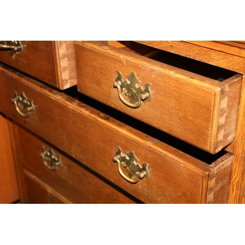 661 - Small oak chest of two short over three long drawers on ball feet, 81cm.