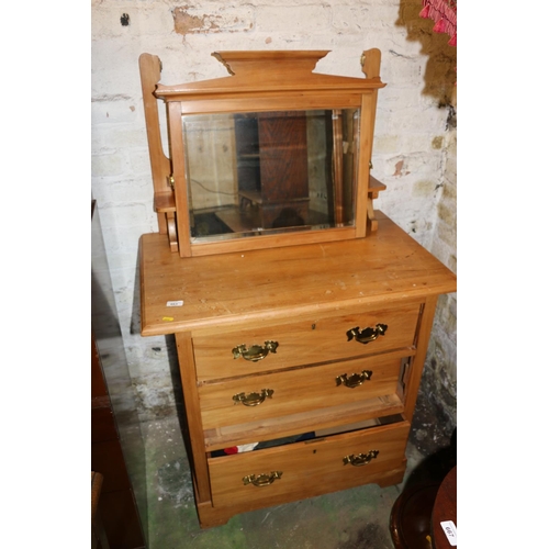 663 - Pine dressing table with swing mirror and three drawers, 161cm high.