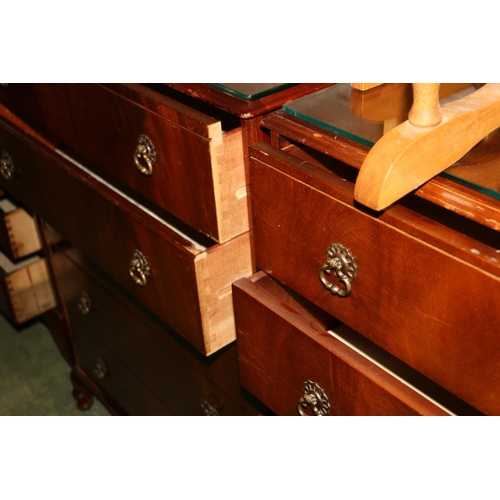 675 - Pair of mahogany drawers with glass tops over five drawers, raised on cabriole supports.