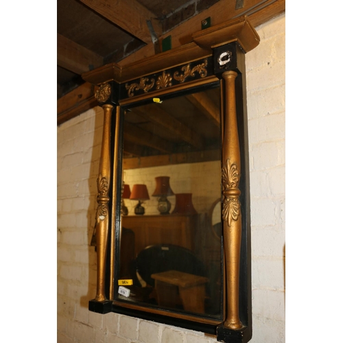 676 - Painted gilt and black gesso wall mirror, 75cm high.