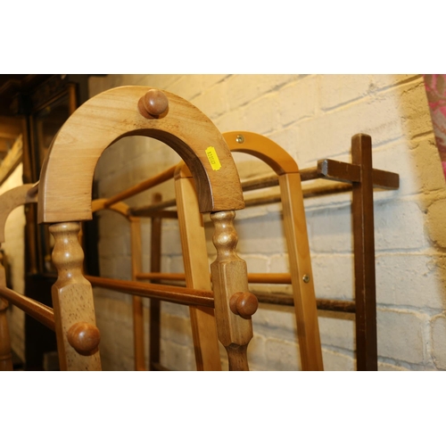 677 - Two pine towel rails, with another similar.(3)