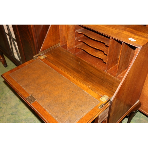 686 - Figured walnut bureau fall front above two short over one long drawers, raised on cabriole legs term... 