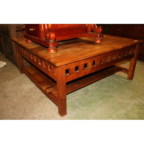 696 - Late 20th century pine square shaped coffee table., 105cm wide.