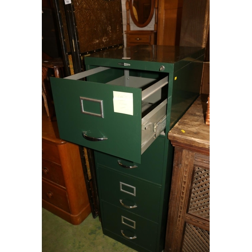 702 - Green painted Harvey Milner filing cabinet, 132cm high.