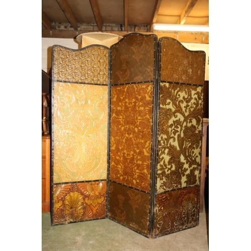 703 - Folding screen with embossed paper decoration, 175cm high.