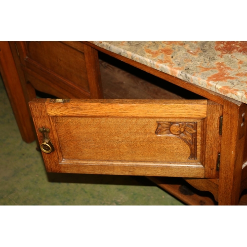 708 - Early 20th century marble top washstand with cupboard underneath.