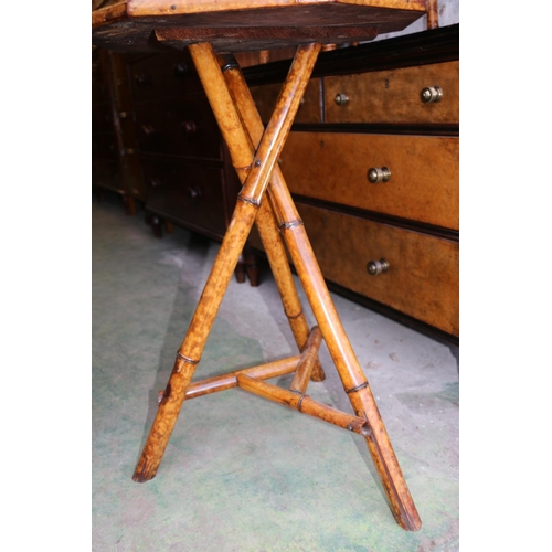 709 - Two occasional tables formed from painted bamboo with floral and oriental bird on branch design deco... 