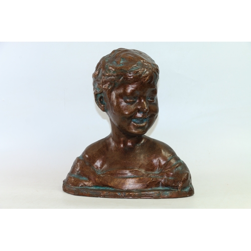 22 - Plaster bust of a young boy having bronzed finish, 33cm high.
