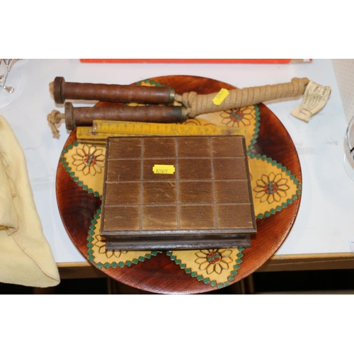 166 - Tribal style carved wooden plates, a small treen box, a vintage skipping rope and a folding ruler.