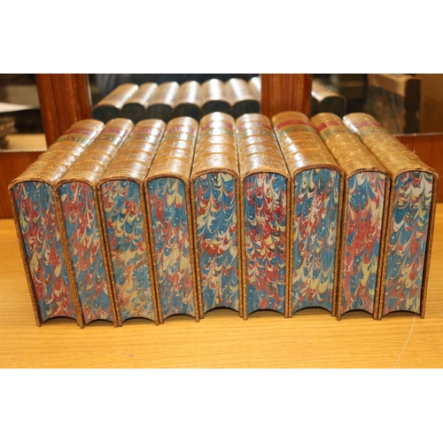 300 - Shelf containing Shakespeare and other leather bound books.