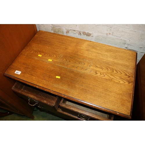 661 - Small oak chest of two short over three long drawers on ball feet, 81cm.