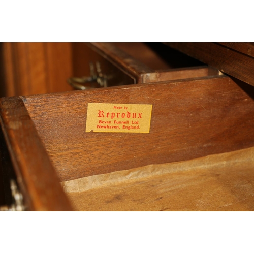 661 - Small oak chest of two short over three long drawers on ball feet, 81cm.