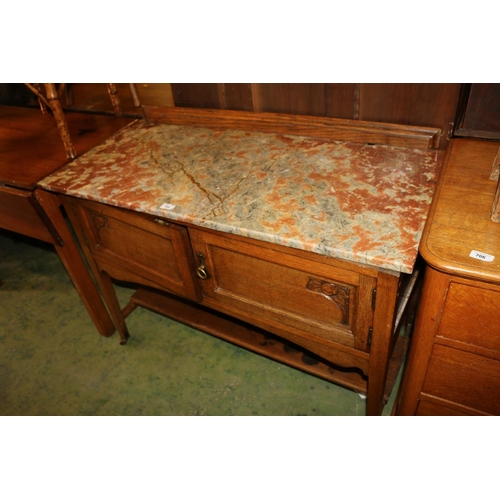 708 - Early 20th century marble top washstand with cupboard underneath.