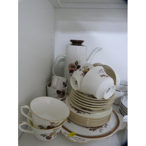 115 - Tea and coffee wares to include Noritake, Royal Worcester and others (one shelf).