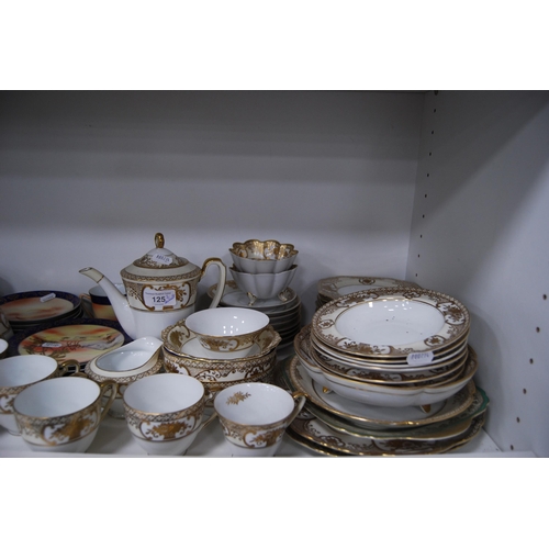 125 - Large quantity of miscellaneous teawares to include Noritake, Tuscan etc (two shelves).