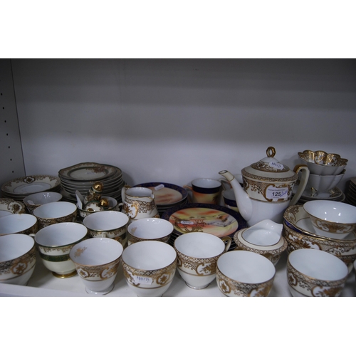 125 - Large quantity of miscellaneous teawares to include Noritake, Tuscan etc (two shelves).