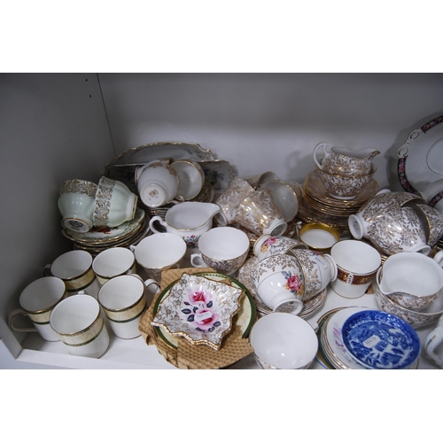 125 - Large quantity of miscellaneous teawares to include Noritake, Tuscan etc (two shelves).