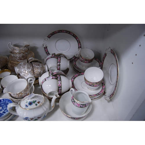 125 - Large quantity of miscellaneous teawares to include Noritake, Tuscan etc (two shelves).