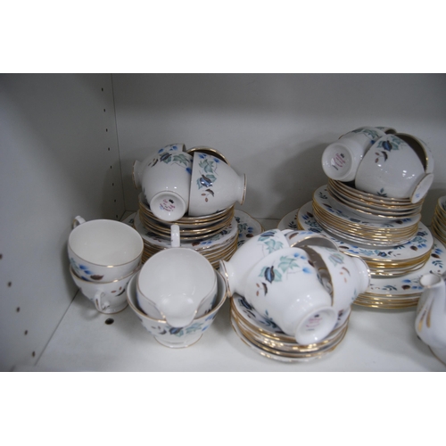 132 - Colclough floral decorated part tea set and a baby plate decorated with an image of a young girl to ... 