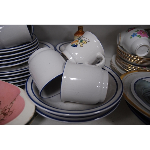 135 - Mexican part breakfast set, floral decorated tea set etc (one shelf).