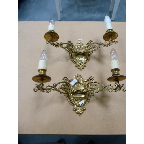 153 - Pair of Art Nouveau-style gilt metal twin-branch wall sconces.  (2)