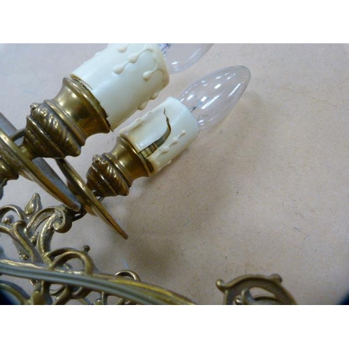 153 - Pair of Art Nouveau-style gilt metal twin-branch wall sconces.  (2)