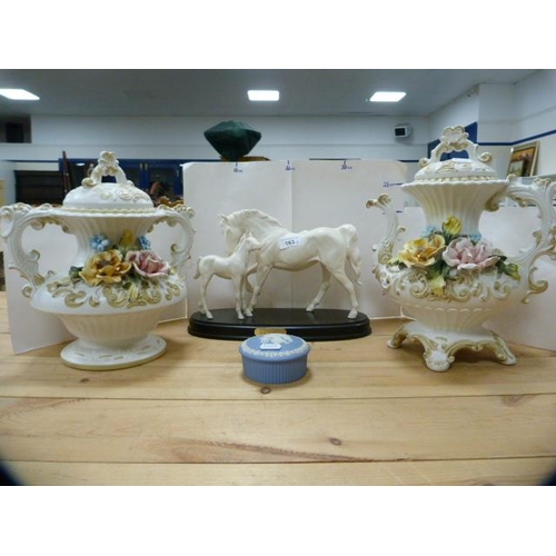 163 - Pair of Capodimonte floral encrusted teapot's, a matching twin-handled vase, horse figure group, 'Sp... 