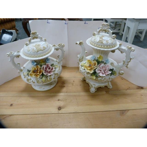 163 - Pair of Capodimonte floral encrusted teapot's, a matching twin-handled vase, horse figure group, 'Sp... 