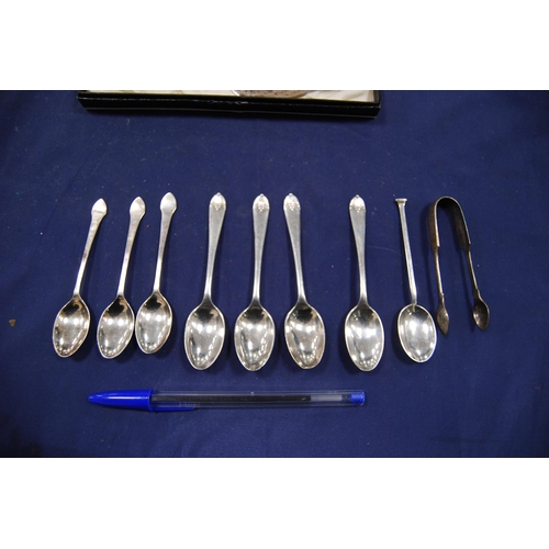 180 - Group of silver flatware to include sugar spoons, spoon and push and a cake knife, approximately 159... 