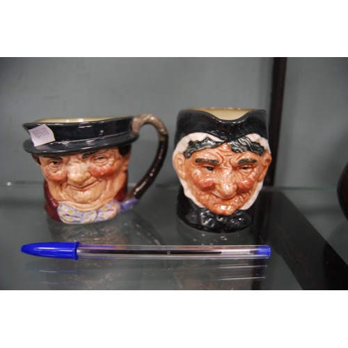 182 - Four small Royal character jugs to include 'John Peel', 'Tony Weller' and 'Granny'.  (4)