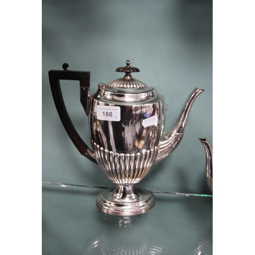 186 - Walker & Hall EP four-piece tea set, monogrammed, with gadrooned decoration.  (4)