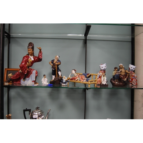 188 - Group of modern Oriental clay figures to include a warrior, sage, Geisha, and other groups.