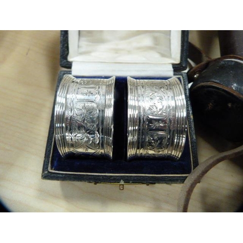 21 - Tins containing pair of boxed silver napkin rings, miscellaneous EP and plated flatware, goblets, al... 