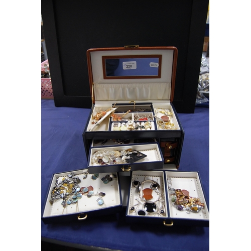 220 - Jewellery box containing assorted costume and silver jewellery to include earrings, chains, bracelet... 