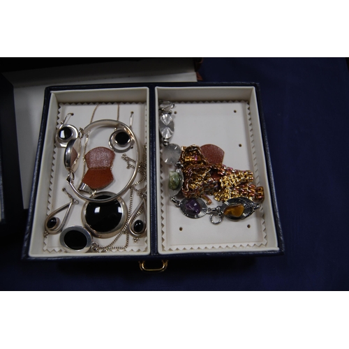 220 - Jewellery box containing assorted costume and silver jewellery to include earrings, chains, bracelet... 