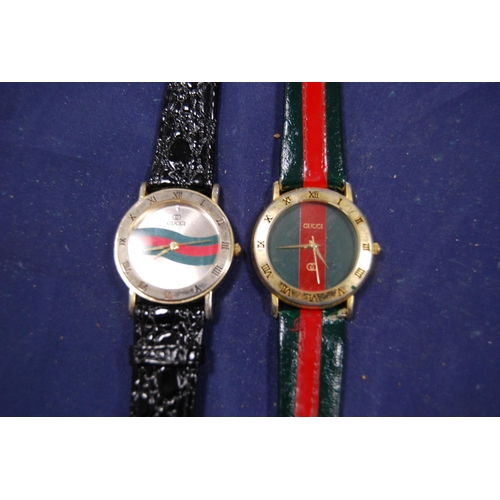 240 - Two Gucci gent's quartz wristwatches.