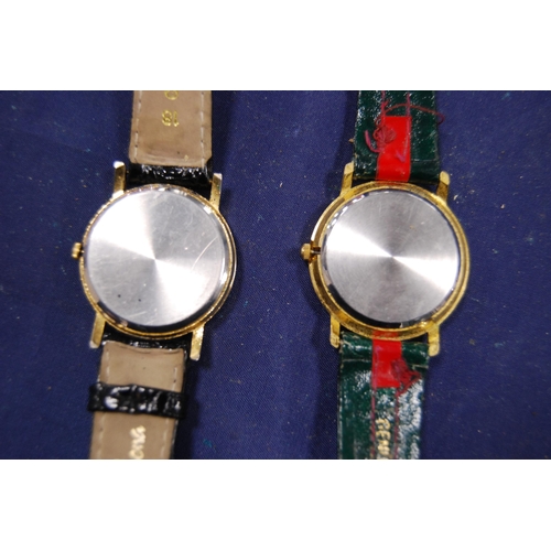 240 - Two Gucci gent's quartz wristwatches.