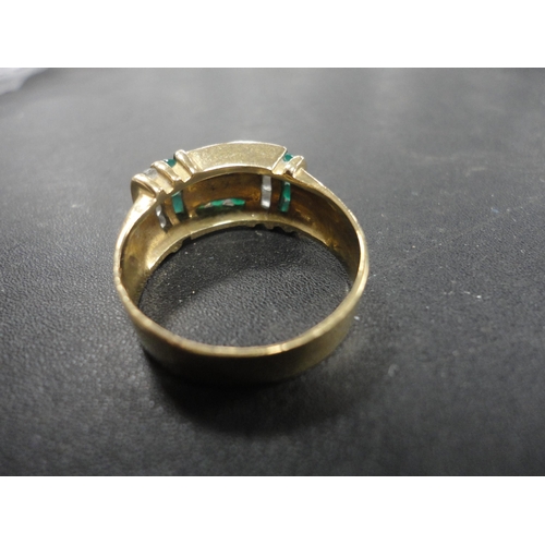 250 - Dress ring with emerald-style and diamond-style stones.