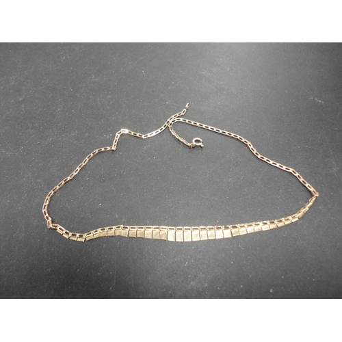 255 - 9k lady's necklace, 2.83g gross.