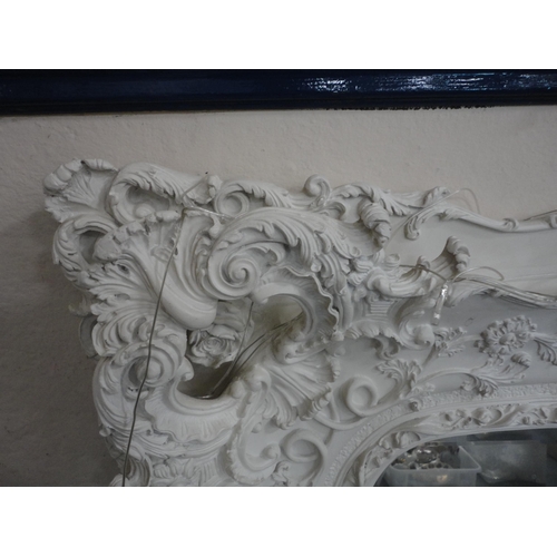 263 - Contemporary painted overmantel mirror in the Rococo style.