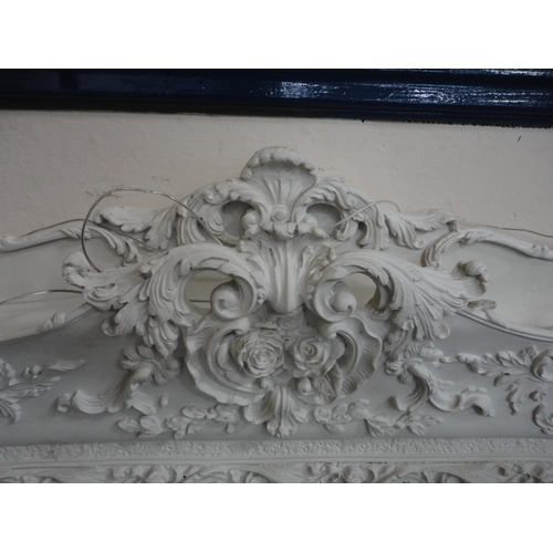 263 - Contemporary painted overmantel mirror in the Rococo style.