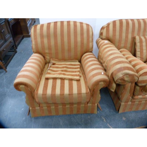 286 - Three-piece upholstered lounge suite comprising a two-seater sofa and a pair of armchairs with cushi... 