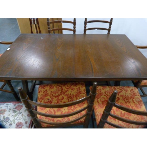 288 - Oak veneered dining table and a set of six ladder-back dining chairs, including two carvers, also a ... 